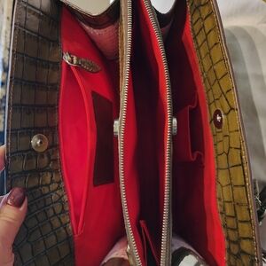 Dooney & Bourke Green Satchel with Multiple Compartments and Durable Material